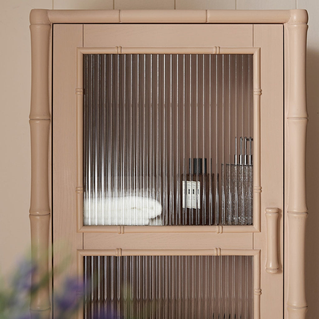 Elstowe Faux Bamboo and Fluted Glass 1-Door Cabinet, Nude Pink